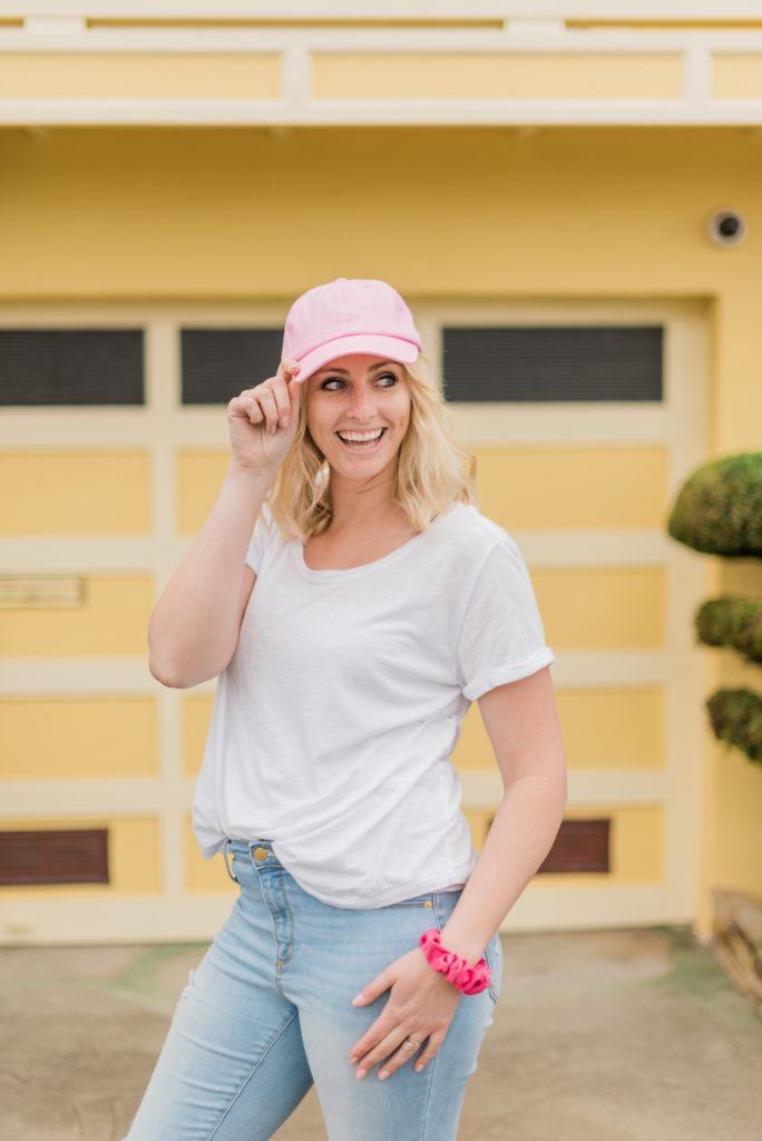 women lifestyle branding photo wearing a pink hat