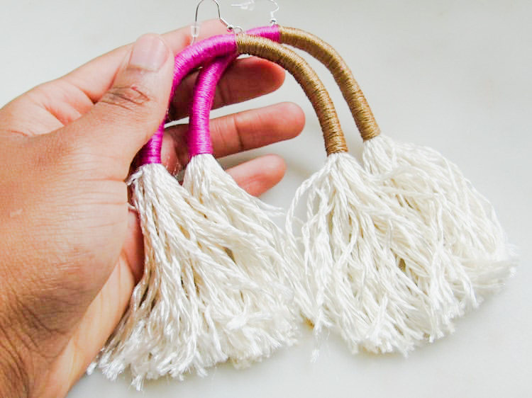 tassel wrapped earrings in pink and brown.