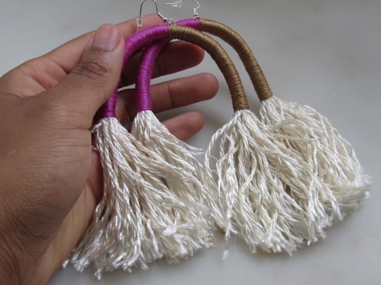 tassel wrapped earrings in pink and brown.