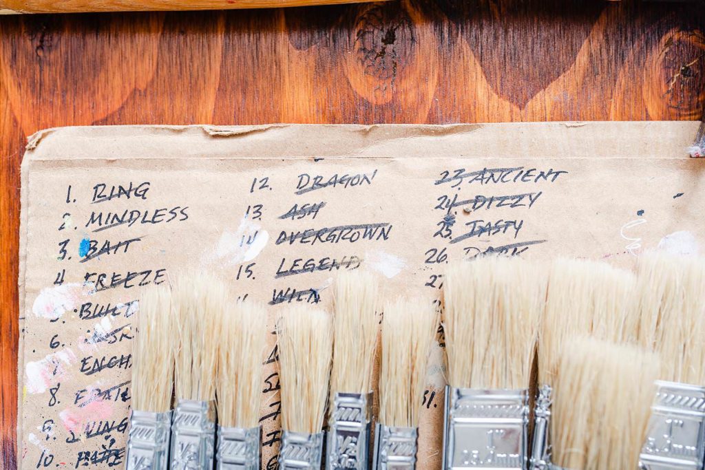 Paint brushes stacked up.