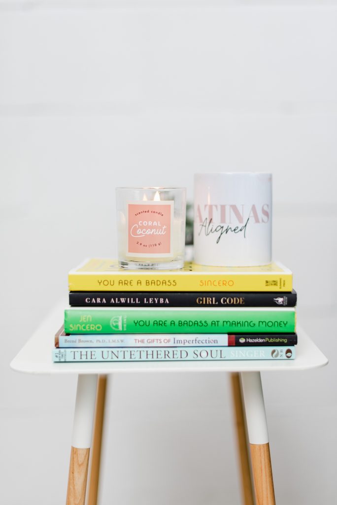 stack of books and a candle