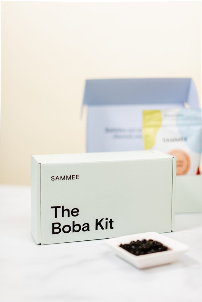 mint green box of The Boba Kit by SAMMEE with boba in a saucer