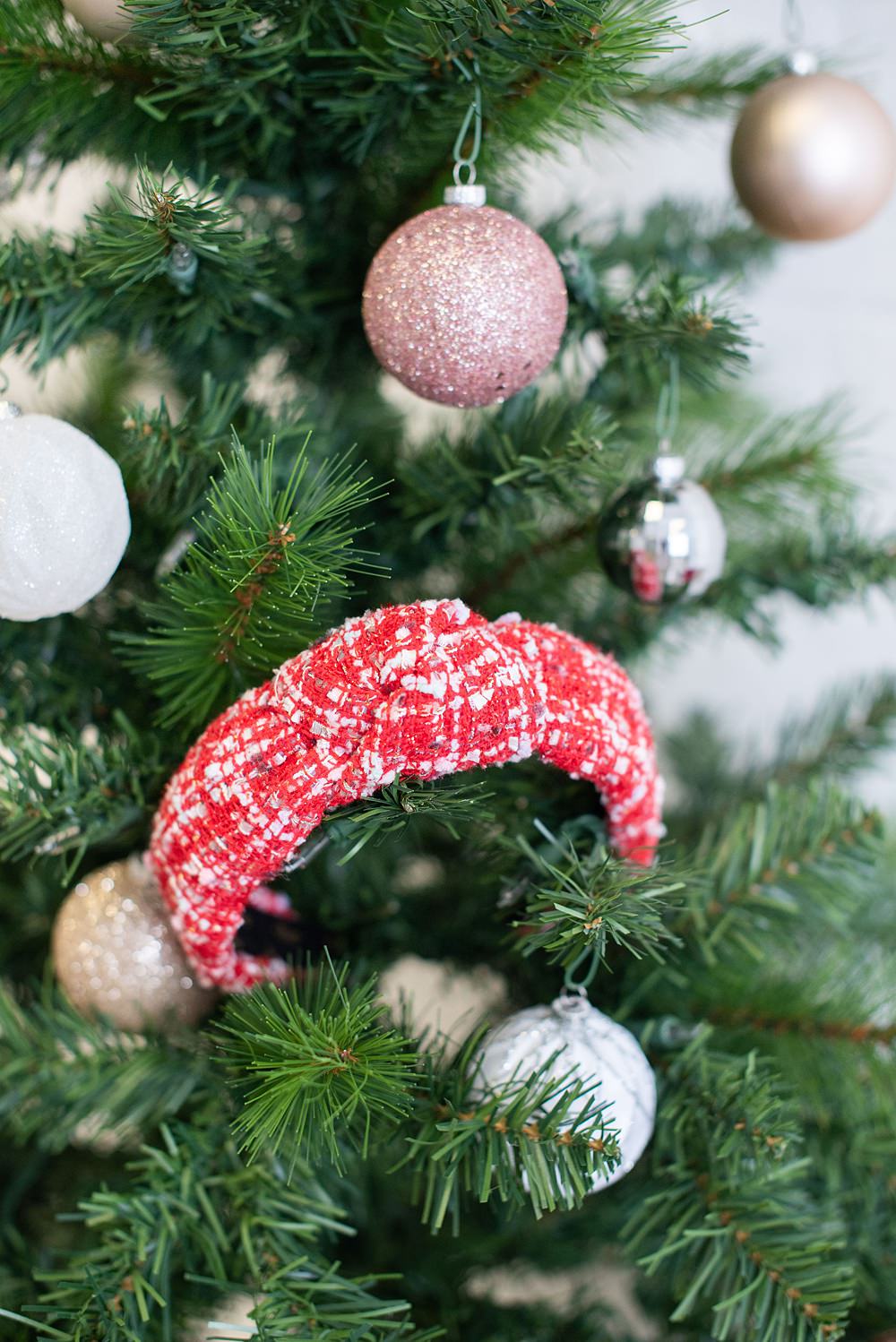 A red headband on the Christmas tree