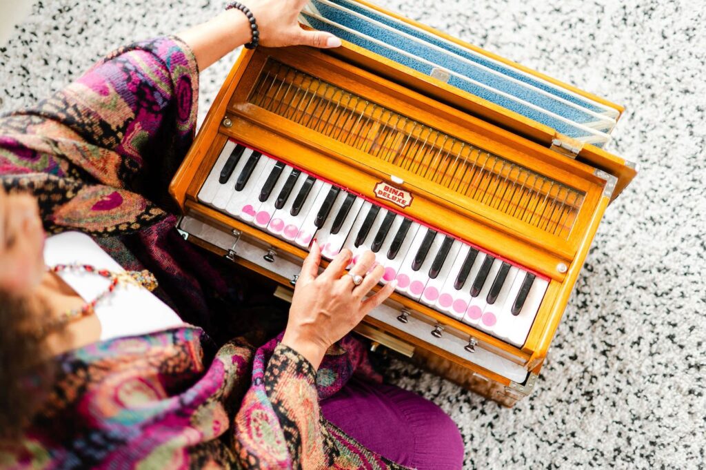 top-down shot of a life coach playing a harmonium